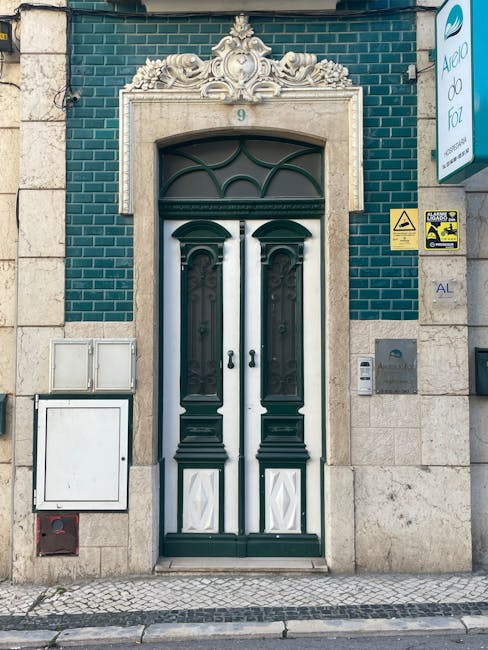 Ornate emerald and white door marked with number 9 representing premium membership access